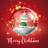 Fototapeta  - Marry Christmas card with transparent glossy soccer football glass ball with Christmas tree decoration - 3d rendering