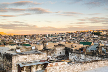 Wall Mural - Aerial panoramic view of historic downtown called medina at sunset, Fez, Morocco.