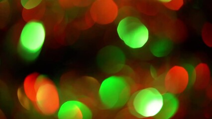 Wall Mural - shimmering overflows of christmas bokeh. round defocused bokeh move beautifully, sparkle and shine. 