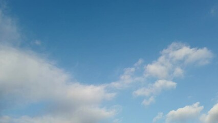 Wall Mural - Beautiful blue sky with some clouds for background.