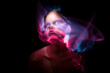 © SergeyKatyshkin - Abstract photography in the style of light painting. girl on a black background