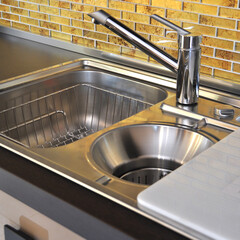 Wall Mural - Interior of modern kitchen and stainless steel sink, tap and drain