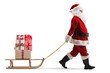 Full length profile shot of santa claus pulling a wooden sled with presents