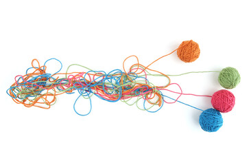 Wall Mural - tangled colorful cotton threads and balls isolated on white background. abstract thread lines chaos 