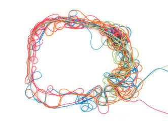 Wall Mural - circle of tangled colorful cotton threads isolated on white background. abstract thread lines chaos 