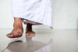 © Gatot - Muslim man enters the holy mosque with his right foot first