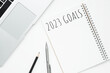 © satapatms - Notebook with 2023 goals text on it to apply new year resolutions and plan.