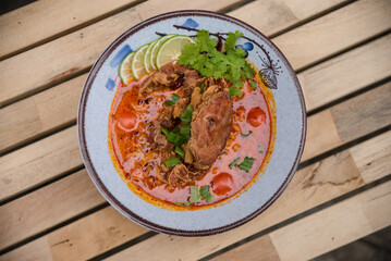 Spicy  ramen with red crab on top. It has abalone and mussels, so the soup is really good.