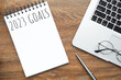 © satapatms - Notebook with 2023 goals text on it to apply new year resolutions and plan.