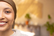 © Wavebreak Media - Portrait of happy biracial woman wearing hijab, looking at camera and smiling