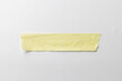 Yellow masking tape and copy space on white background