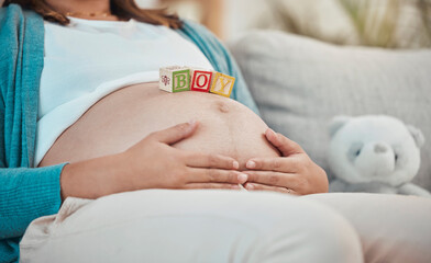 Poster - Mother, stomach and toys with a boy baby for expecting mother relaxing at home on the sofa. Child, announcement and pregnancy notification with a woman with wood blocks on her belly for a son