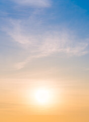 Wall Mural - sunset sky vertical in the morning with orange, yellow sunrise clouds