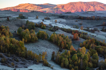 Wall Mural - Beautiful landscape with first frosts in the Apuseni mountains at sunrise. Dumesti,Alba,Transylvania.