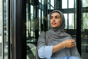 Wall Mural - Muslim woman standing outdoors