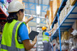 © เลิศลักษณ์ ทิพชัย - Asian female foreman talking to female worker Checking stock using tablet inside retail warehouse with products Logistics: online orders ecommerce purchase