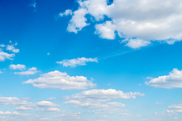 Wall Mural - blue sky background with white clouds