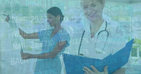 Canvas Print - Animation of trading board over multiracial doctors holding clipboard and checking x-ray report