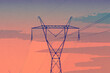Ilustracja słupy elektryczne na tle różowego nieba.