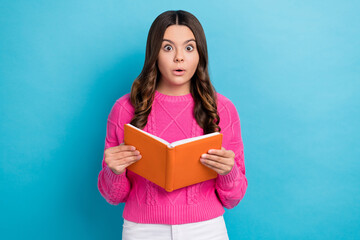 Canvas Print - Photo of impressed cute girl dressed knit pullover enjoying good story isolated blue color background