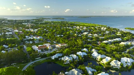 Wall Mural - View from above of large residential houses in island small town Boca Grande on Gasparilla Island in southwest Florida. American dream homes as example of real estate development in US suburbs