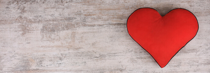 pillow red heart on old white wooden background