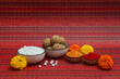 Happy Makar Sankranti, Pongal and Uttarayan with Kite, haldi kum kum bowls and tilgul sweets