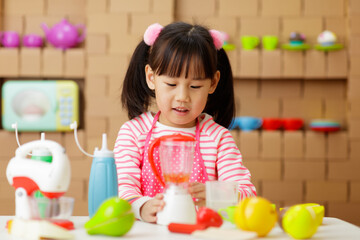 Sticker - young girl pretends playing food preparing at home