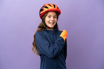 Poster - Little caucasian girl isolated on purple background celebrating a victory