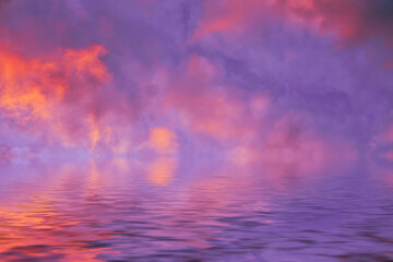 Wall Mural - water surface with beautiful clouds at sunset