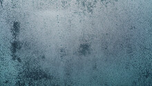 Condensation On Window Glass In Frosty Winter Weather. Background In The Form Of Small Drops On The Glass.