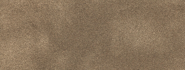 Texture of dark beige velvet matte background, macro. Suede brown fabric with pattern.
