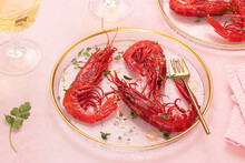 Plate With Prawns On Table Pink Background
