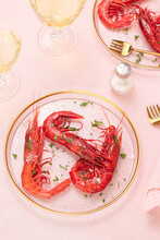 Plate With Prawns On Table Pink Background