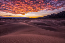 Sunset Over Sand Dunes In California, Death Valley National Park; California, United States Of America