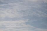 Fototapeta Niebo - Blue sky background, white cirrus clouds.