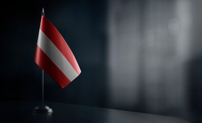 Small national flag of the Austria on a black background