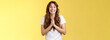 Please one small favor. Cute silly charming young girlfriend asking lend money press palms together praying supplication gesture implore you help hopefully smiling begging yellow background