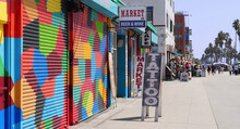  Closed Storefront Of A Tattoo Parlor On The Boardwalk In Venice Beach, Los Angeles, California, USA
