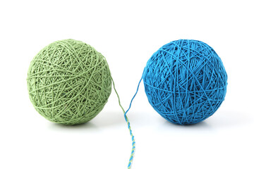 Wall Mural - two big thread balls green and blue isolated on white background. balls of natural cotton string.