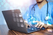 © Suriyo - Doctor using computer Document Management System (DMS), online documentation database process automation to efficiently manage files