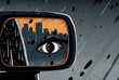 © The 2R Artificiality - A close up of a black car's rearview mirror with rainfall on it. Generative AI