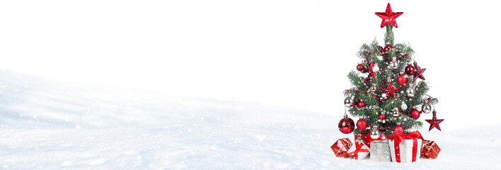 Wall Mural - christmas tree with decoration on a winter background.