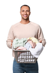 Happy man with basket full of laundry on white background