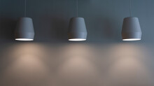 Lamps Hang On A Gray Wall