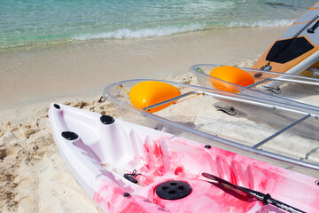 Wall Mural - Transparent kayak canoe on the beach