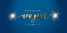 We Wish You Happy Holidays 2023 Banner. Modern Design, New Updated Handwritten Gold Lettering With White Blue 2023 Year Background And Sparkle Firework