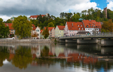 Wall Mural - River view on Landberg-am-Lech town, Germany on a cloudy autumn day