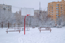 Basketball Court On The Territory Of A Comprehensive School In Winter. Balashikha, Russia
