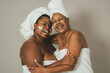© Alessandro Biascioli - Happy African multigenerational women having skin care spa day - People wellness lifestyle concept